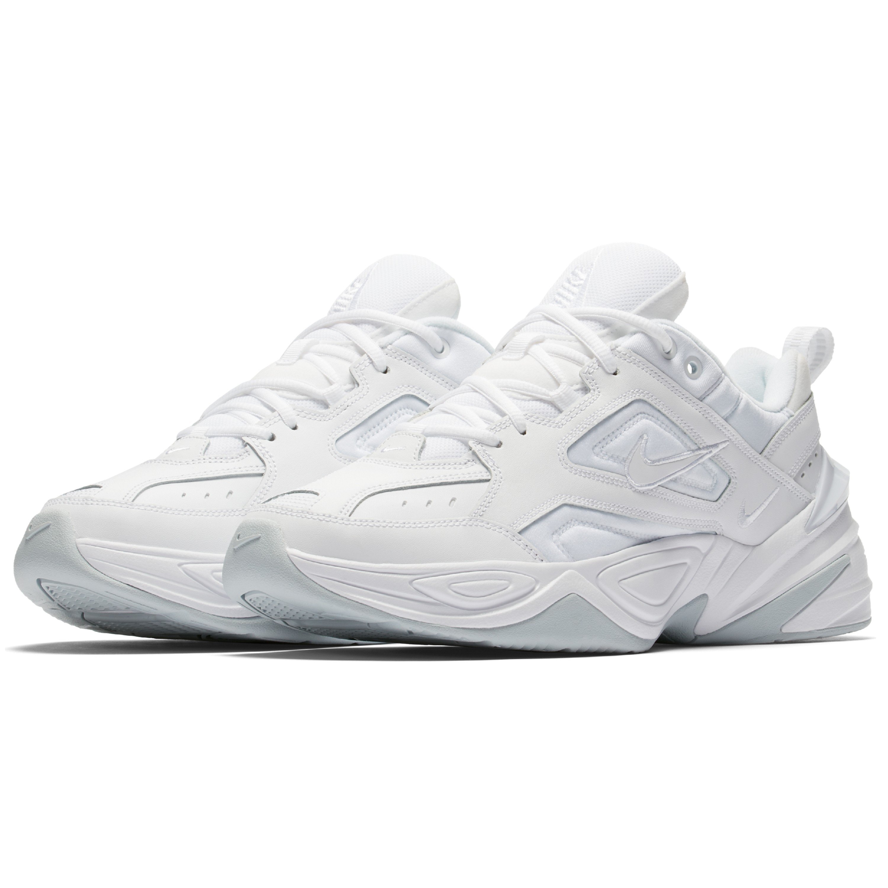 white and beige nike m2k tekno
