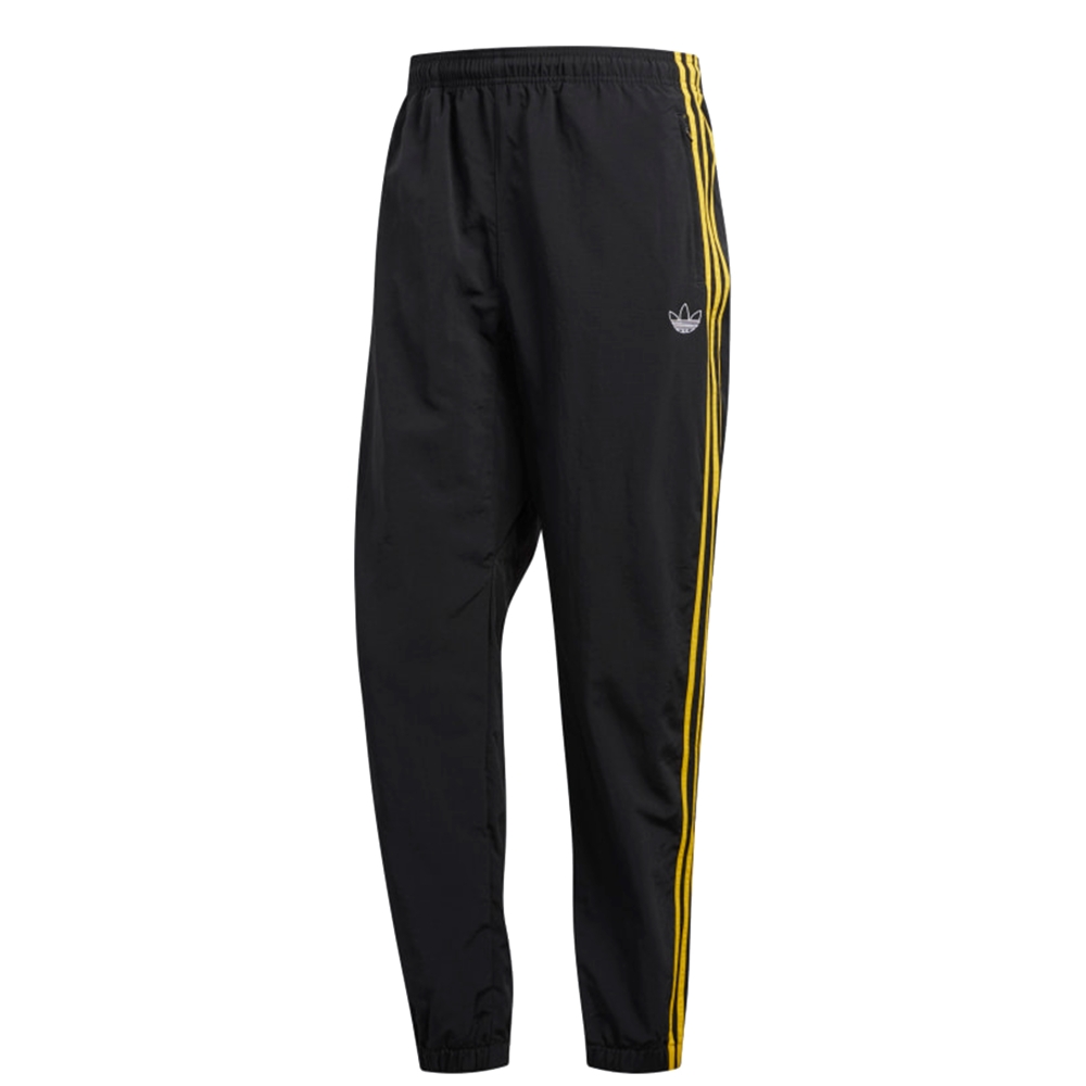 black adidas pants with gold stripes
