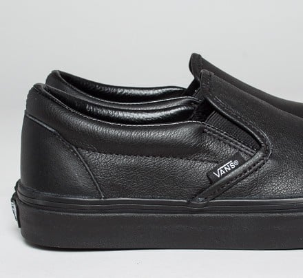 vans slip on all black leather